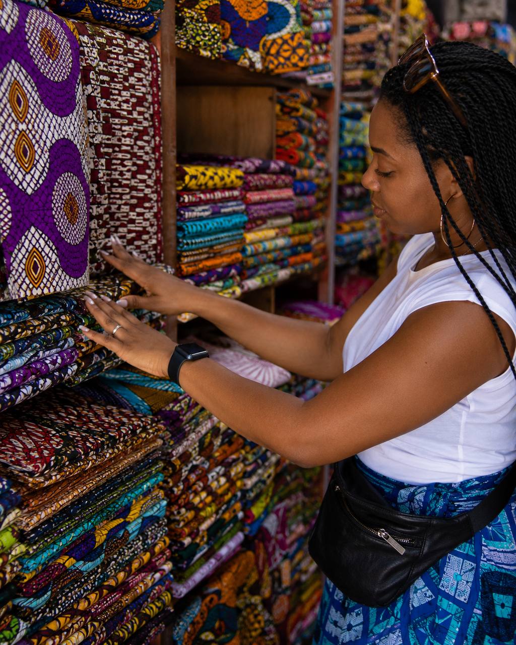 Client choosing fabric during a Design Tour